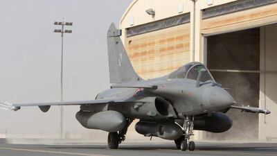 Handout picture released by French Defence Audiovisual Communication and Production Unit (ECPAD) shows French army Rafale fighter before taking off from a base in the Gulf as they embark for Syria on an Intelligence Surveillance and Reconnaissance (ISR) mission as part of France's Operation Chammal launched in September 2015 in support of the US-led coalition against ISIL. France said on September 27, 2015, it had carried out its first air strikes against the ISIL group in Syria. AFP Photo / ECPAD