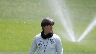 Coach Joachim Low watches the session in Austria. Getty