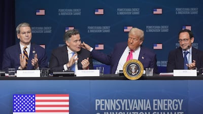 President Donald Trump, second from the right, speaking at the "Inaugural Pennsylvania Energy and Innovation Event" at Carnegie Mellon University, Tuesday, July 15, 2025, in Pittsburgh. With the President are from left, Treasury Secretary Scott Bessent, Sen. Dave McCormick, R-Pa. , and Jon Gray, President and Chief Operating Officer, Blackstone. (AP Photo/Gene J. Puskar)