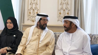 Sheikh Tahnoon bin Mohamed, Ruler's Representative in Al Ain Region, speaks with Sheikh Saif bin Mohamed and Dr Amal Abdullah. Mohamed Al Hammadi / Ministry of Presidential Affairs