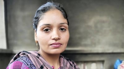 Amandeep Kaur, 38, wakes up at 4am every day to care of the family's livestock and crops in Rauni village while her husband takes part in protests in New Delhi.