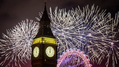 Fireworks light up the sky over the London Eye and the Elizabeth Tower (Big Ben) in central London during New Year celebrations on January 1, 2023. Photo: PA