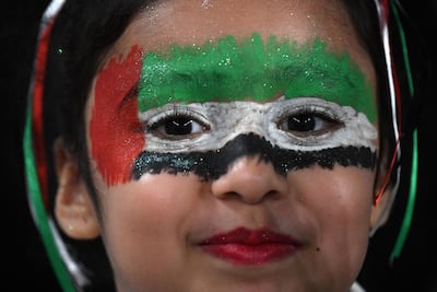 A young UAE fan at the quarter final match between Australia and UAE in Al Ain. AFP
