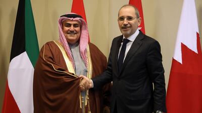Bahraini Foreign Minister Sheikh Khalid bin Ahmed Al Khalifa greets Jordanian Foreign Minister Ayman Safadi at the King Hussein Convention Centre at the Dead Sea. Reuters