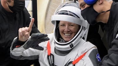 Nasa astronaut Shannon Walker emerges from the SpaceX Crew Dragon capsule onboard the SpaceX GO Navigator recovery ship. AP Photo