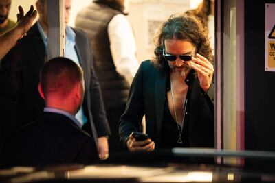 Russell Brand leaves the Troubadour Wembley Park theatre in north-west London after performing a comedy set. PA