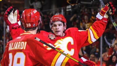 Sean Monahan, right, of the Calgary Flames celebrates along with T.J. Galiardi after scoring against the New York Islanders during an NHL game at Scotiabank Saddledome on March 7, 2014 in Calgary, Alberta, Canada. The Flames defeated the Islanders 4-3. Derek Leung/Getty Images