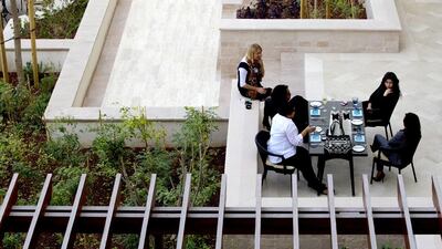Guests have lunch at St Regis hotel. Christopher Pike / The National