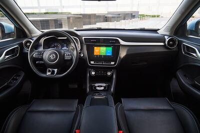 The interior has an 8.0-inch touchscreen for navigation, a reverse parking camera, Apple CarPlay and Android Auto