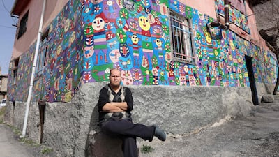 After Yalcin ran out of canvas, which his father Hasan bought him, he started painting on the walls and facade of their home.