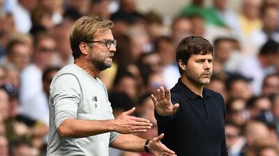 The passion of both managers was transferred onto the pitch during the feisty draw between Tottenham and Liverpool. Dylan Martinez / Reuters