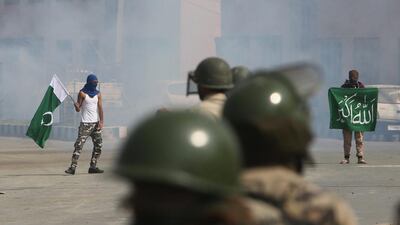 Kashmiri Muslim protesters and Indian police paramilitary soldiers clash during protests after Eid al-Adha prayers in Srinagar, India. Farooq Khan / EPA