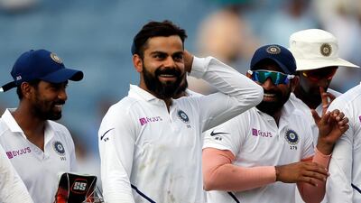 Virat Kohli, center, led India to series victory over South Africa in Pune. AP