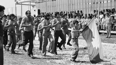 A parade at the swearing-in ceremony of young supporters of Camille Chamoun, leader of the right-wing Christian NLP, at Hadath, in the Beirut suburbs, close to Baabda presidential palace, on October 14, 1977.