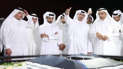 Secretary General Hassan Al Thawadi, third form left, of Qatar's Supreme Committee for Delivery and Legacy, shown during a June news conference to announce the start of work on Al Khor Stadium. Mohammed Dabbous / Reuters / June 21, 2014