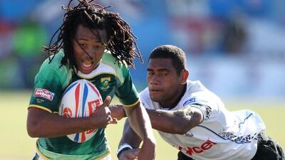 Cecil Afrika, left, made his breakthrough year in the 2010/11 Sevens World Series. His South Africa coach, Paul Treu, says he can easily adapt to 15-a-side rugby.