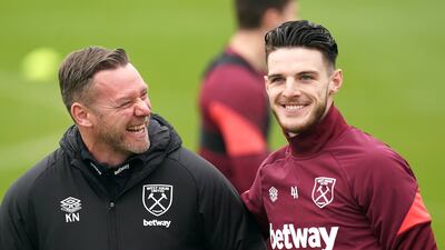 West Ham coach Kevin Nolan with Declan Rice. PA