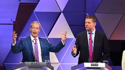 Reform UK leader Nigel Farage, left, disputes a point with Plaid Cymru's Rhun ap Iorwerth during the BBC Election Debate in London. Photo: PA News