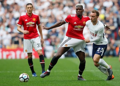Manchester United's Paul Pogba, centre, needed to raise his game on Saturday, and he did just that. David Klein / Reuters