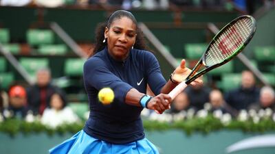 Serena Williams hits a backhand against Yulia Putintseva during their French Open quarter-final match. Clive Brunskill / Getty Images
