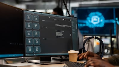 An IT specialist interacts with a large language model application. Getty Images