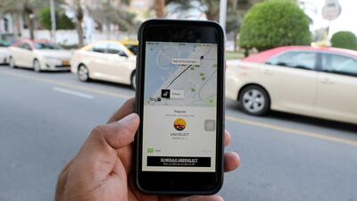 Uber is keen to get back on the road in Abu Dhabi, but says pricing regulations need to change first. Pawan Singh / The National