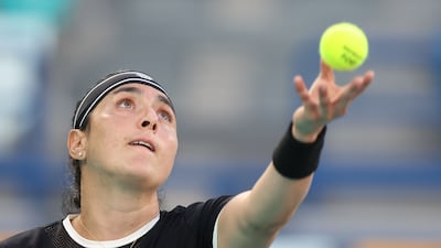 Ons Jabeur serves at Zayed Sports City.