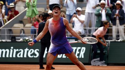 Iga Swiatek of Poland celebrates securing her fourth French Open title following her 6-2, 6-2 win Jasmine Paolini. EPA