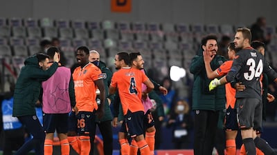 Istanbul Basaksehir players celebrates at the whistle. AFP