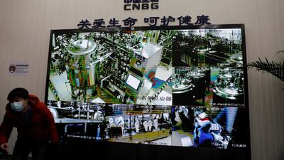 A monitor shows real-time footage of the production line at Sinopharm's vaccine production centre. Reuters
