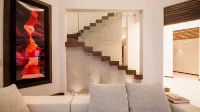 2: Located at the tip of the Frond, the villa has been remodelled with a contemporary finish dominated by white marble.