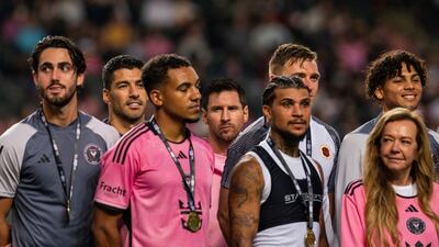 Inter Miami's Lionel Messi, centre, following the friendly at the Hong Kong Stadium. AP