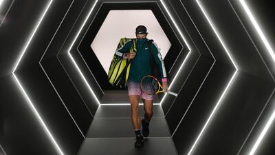 Rafael Nadal arrives on court for match against Feliciano Lopez. Reuters