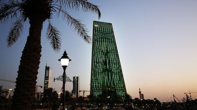 Kuwait's central bank decorated with the colours of Saudi Arabia's flag ahead of Saudi Crown Prince Mohammad Bin Salman's visit to Kuwait, in Kuwait City. AFP