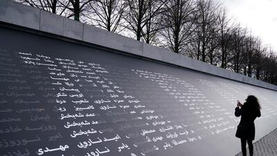 A piece of art written in Farsi is part of the exhibition. AP