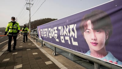 A banner bearing Jin's picture near an army training centre in Yeoncheon. AP