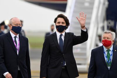 Canadian Prime Minister Justin Trudeau waves as he arrives ahead of the G7 meeting at Cornwall airport in Newquay, Cornwall. Reuters