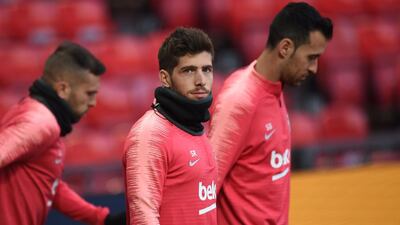 Barcelona's Spanish midfielder Sergi Roberto (C) attends a training session at Old Trafford stadium in Manchester, north west England on the eve of their UEFA Champions League quarter final first leg football match against Manchester United. AFP
