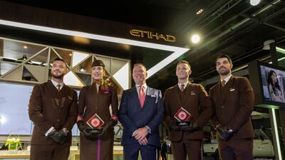 Tony Douglas and Etihad Airways Cabin Crew. Etihad was recognised as the airline with the "Best Cabin Crew" as well as being awarded the "Best First Class" at the Business Traveller Middle East Awards. Photo: Etihad