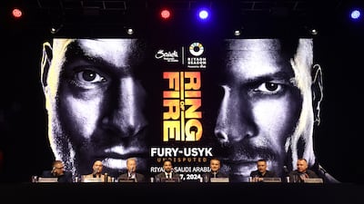 A general view of a screen advertising the fight behind the fighters, speakers and promoters. Getty