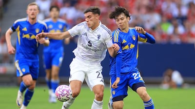 Manchester United's Manuel Ugarte, left, during a pre-season friendly against Leeds United at Strawberry Arena in Sweden. Getty Images