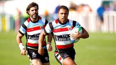 Jason Robinson of Joining Jack scores a try during the Dubai Rugby Sevens match between Gulf Legends and Joining Jack at The Sevens stadium.
