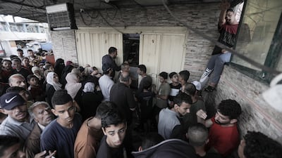 Khan Yunis camp residents line up for bread, in the southern Gaza Strip, 17 October 2023. EPA