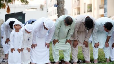 Prayers outside. Pawan Singh/The National
