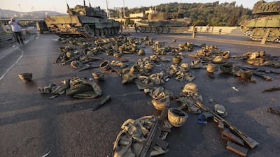 Clothes and weapons belonging to Turkish soldiers involved in the coup attempt that have now surrendered lie on the ground abandoned on Bosphorus bridge. Gokhan Tan / Getty Images