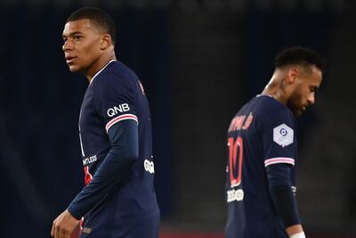 Paris Saint-Germain forwards Kylian Mbappe (L) and Neymar. AFP