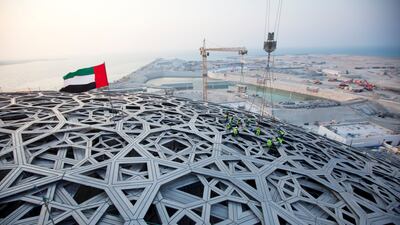 The final piece of the roof is put into place in September 2016. Christopher Pike / The National