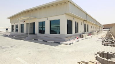 The new regional headquarters of cargo-inspection company Geochem has been built out of 42 shipping containers by Dubai company Smartbox. Jeffrey E Biteng / The National
