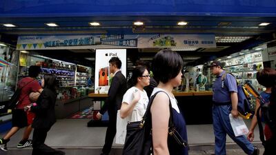 The Chinese electronics retailer is seeking deals to help to create a global sporting ‘ecosystem’. Bobby Yip / Reuters