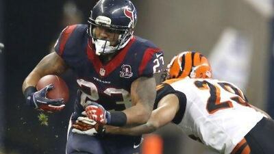 Arian Foster, left, of the Houston Texans is not your typical NFL running back. He keeps a journal with poems and short stories he has written. During a bye week he visited the Occupy Wall Street protest in New York. And he's a vegetarian.
